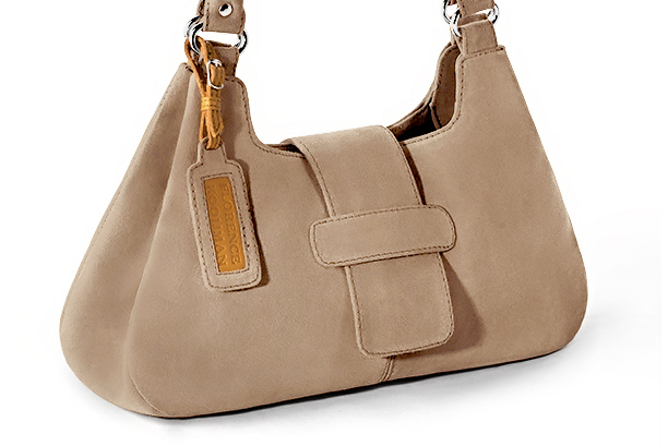 Handcrafted women's luxurious elegant handbag in premium tan beige leather. Perfect for elevated everyday style.   
                Choose from our luxurious collections of leather and fabric to perfectly match your handbags to your outfits.